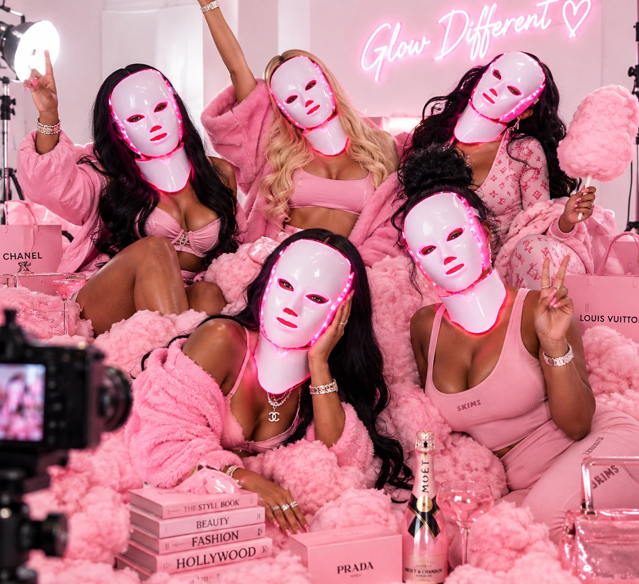GlowGirls group wearing pink LED masks